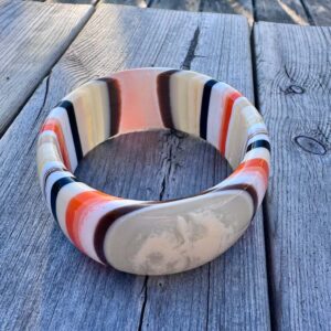 Snyggt plastarmband Orange randigt